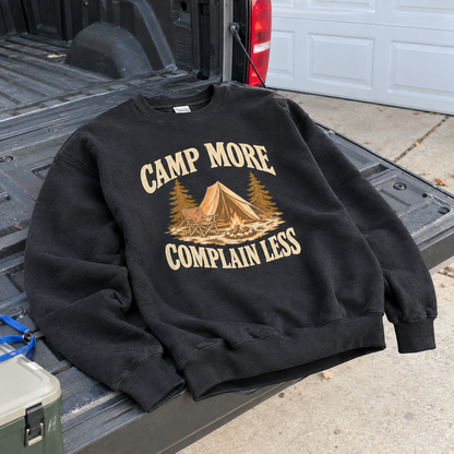Black vintage sweatshirt with printed Camp More Complain Less camping tent graphic on truck bed