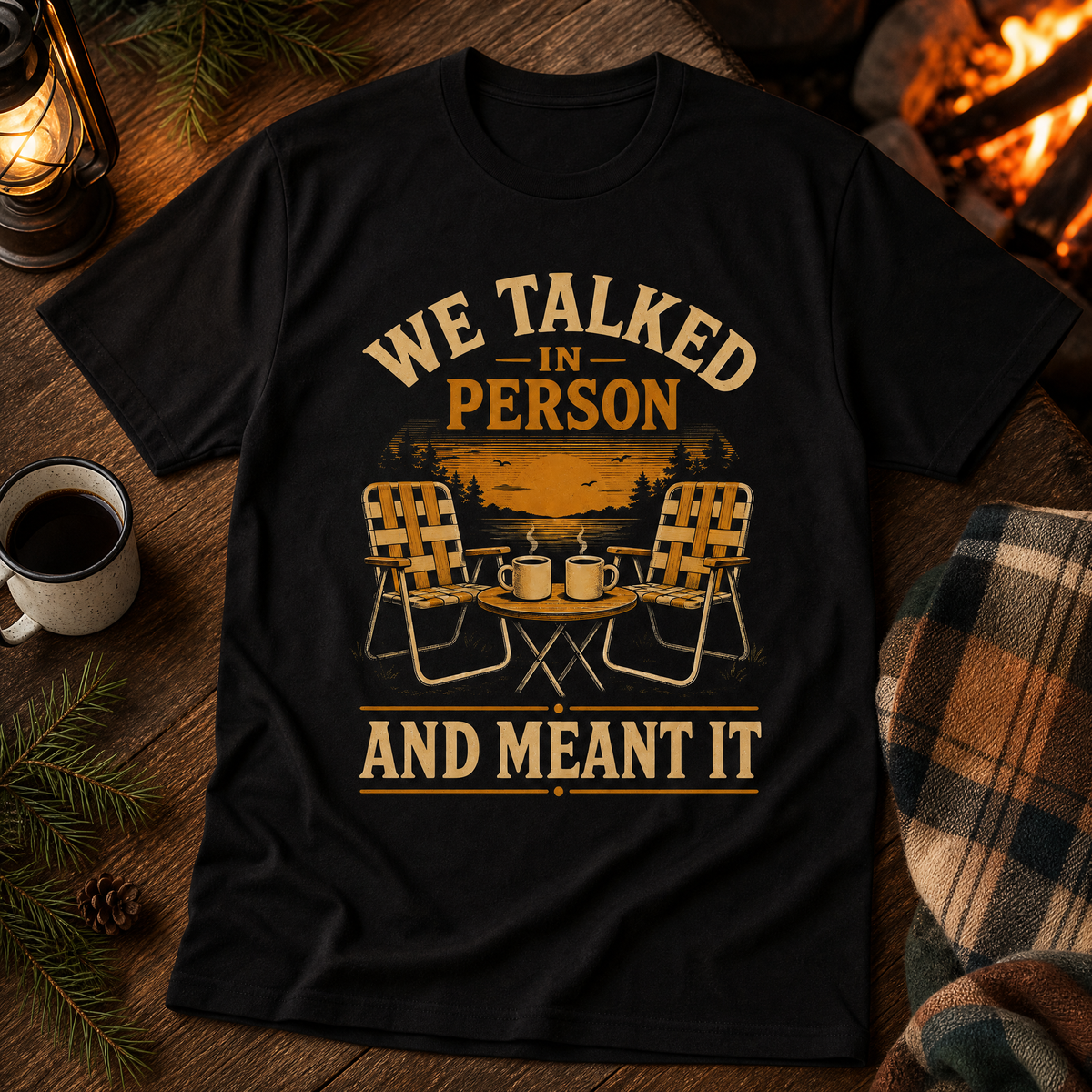 Black vintage t-shirt with “We talked in person and meant it” printed design.