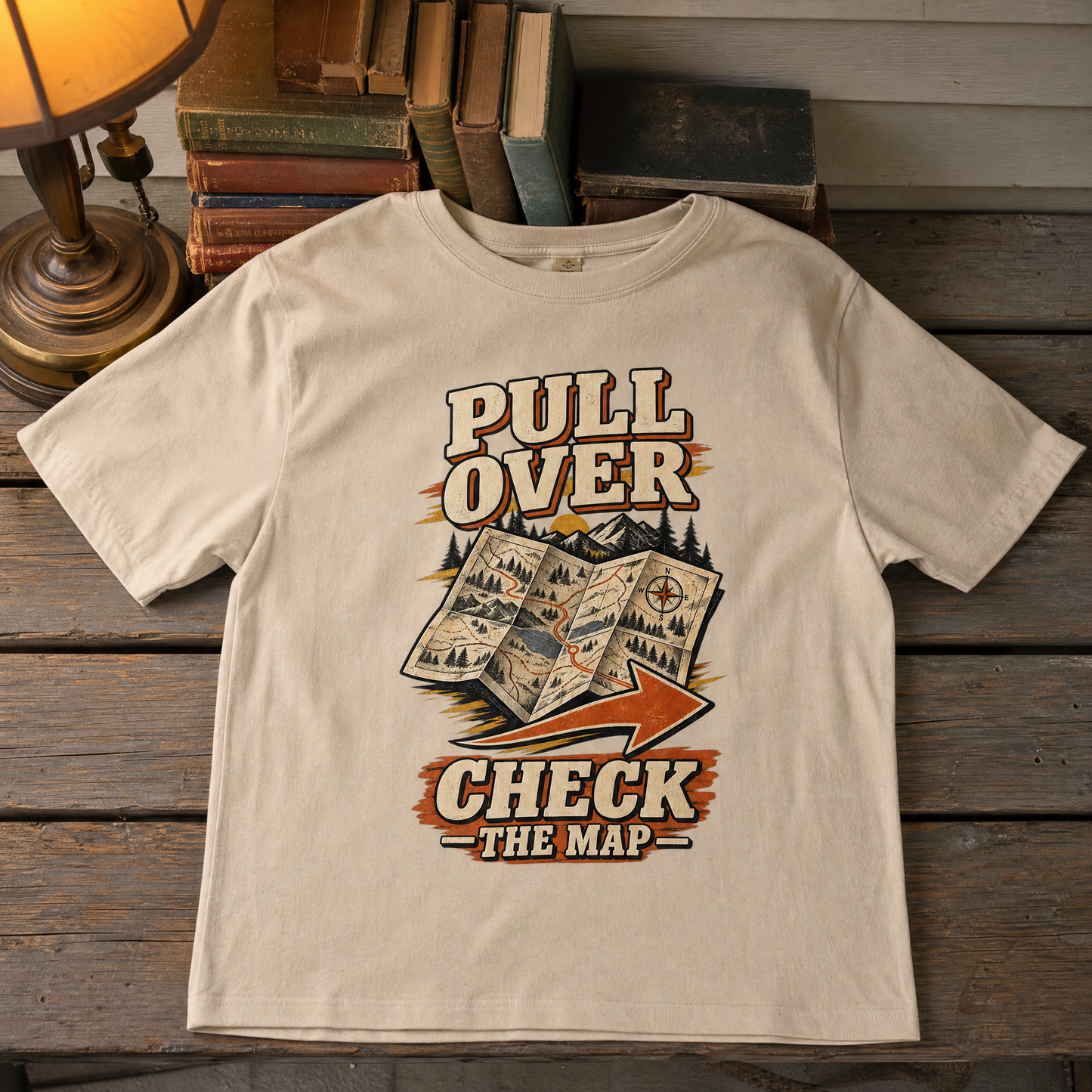 Cream vintage t-shirt featuring printed “Pull Over. Check The Map” slogan and map graphic.