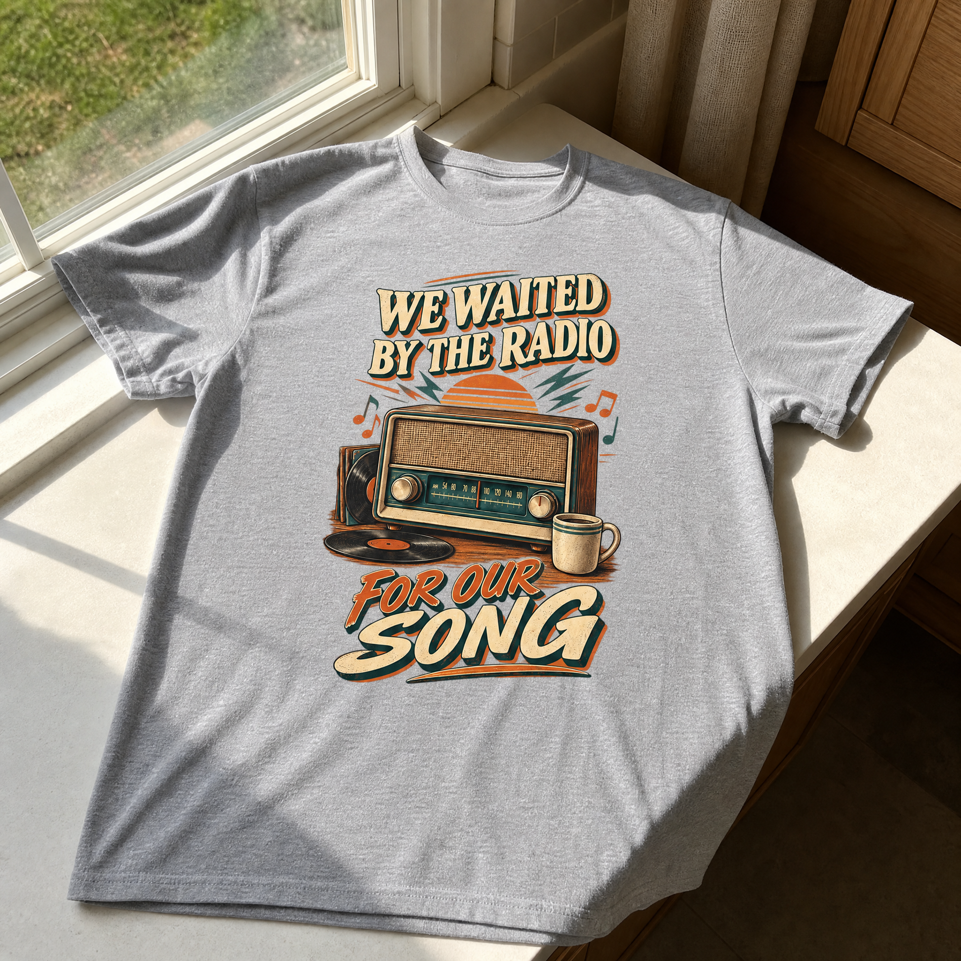 Gray vintage t-shirt with printed “We Waited By The Radio For Our Song” design