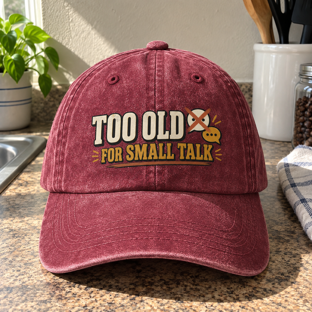 Front view of burgundy vintage washed cap with printed Too Old For Small Talk slogan