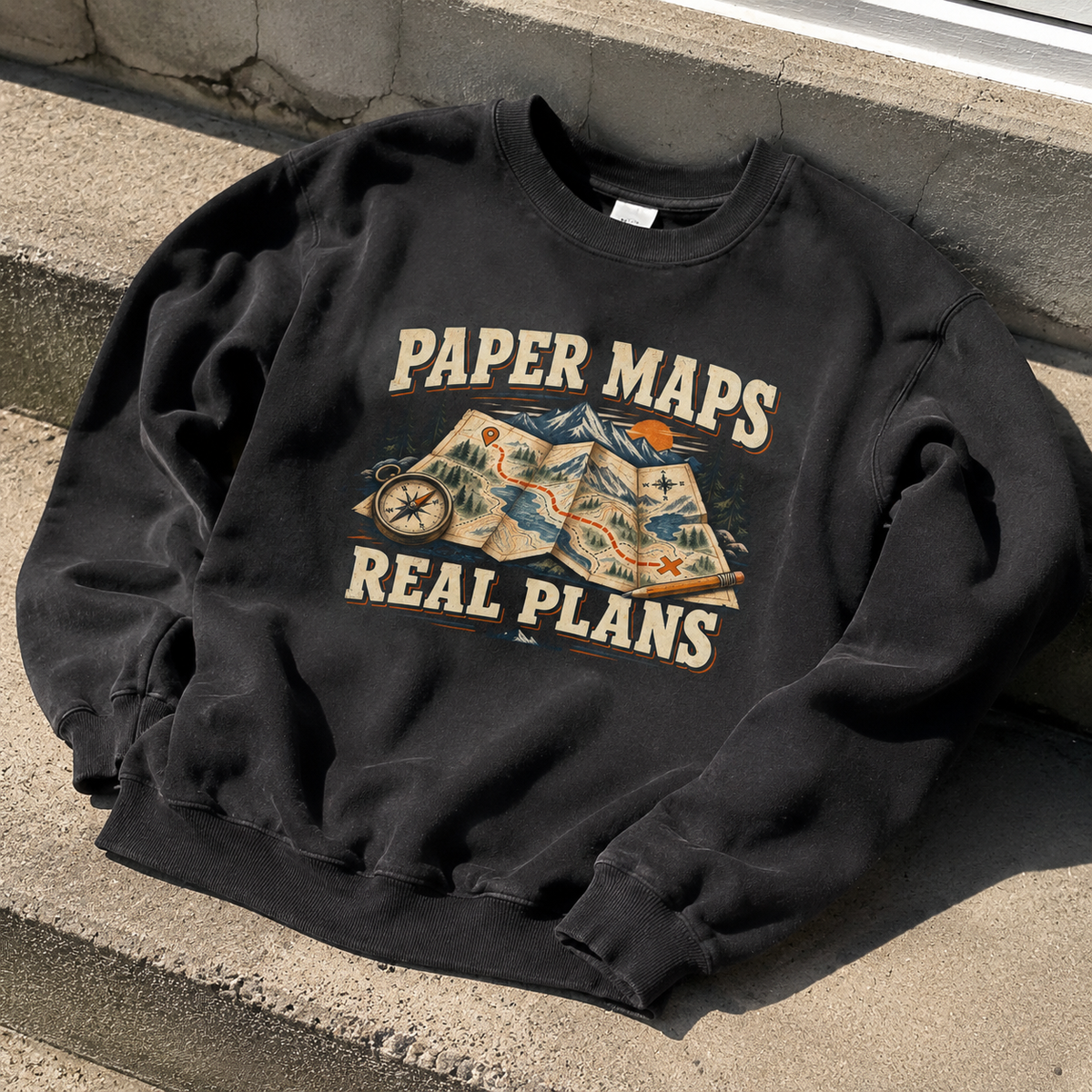 Black vintage sweatshirt with printed Paper Maps Real Plans design on front view