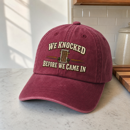 Burgundy vintage washed cap with printed “We Knocked Before We Came In” slogan, hero view.
