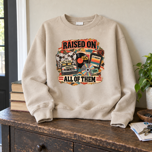 Beige vintage sweatshirt with printed Raised On All Of Them retro music design