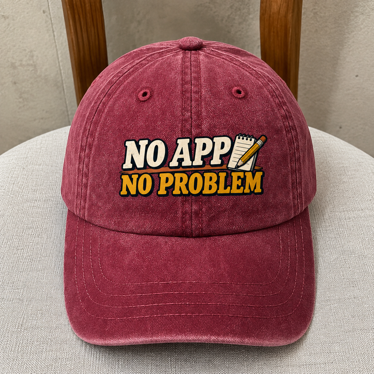 Burgundy vintage washed cap featuring printed “No App. No Problem” slogan, front hero view