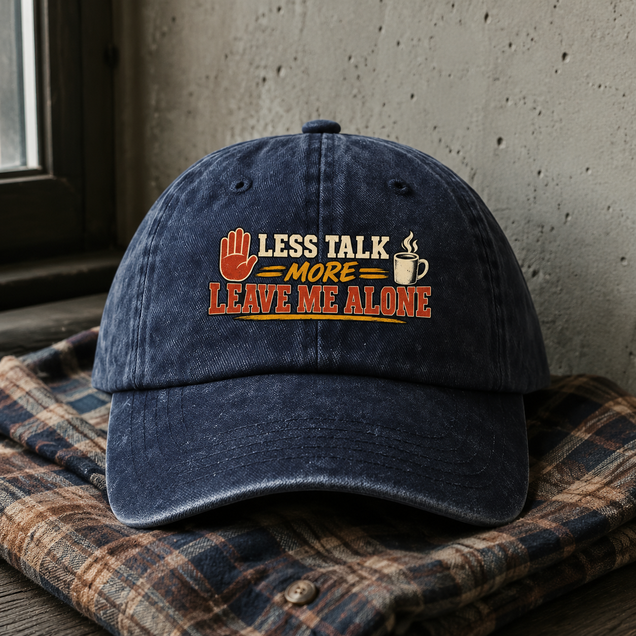 Navy vintage washed cap with printed Less Talk More Leave Me Alone slogan front view