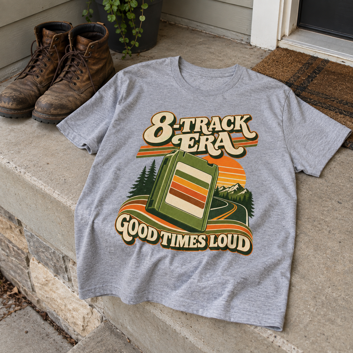 Gray vintage t-shirt on porch with printed cassette and 8-Track Era Good Times Loud design