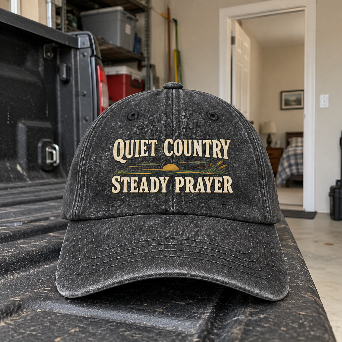 Charcoal vintage washed cap with printed Quiet Country Steady Prayer slogan on truck bed