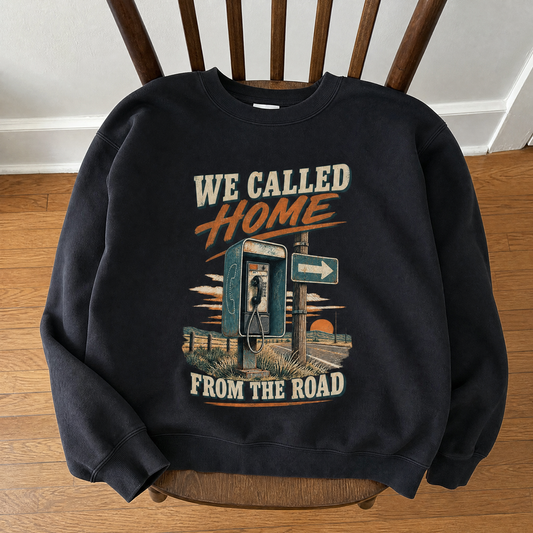 Black vintage sweatshirt with printed “We Called Home From The Road” road trip design