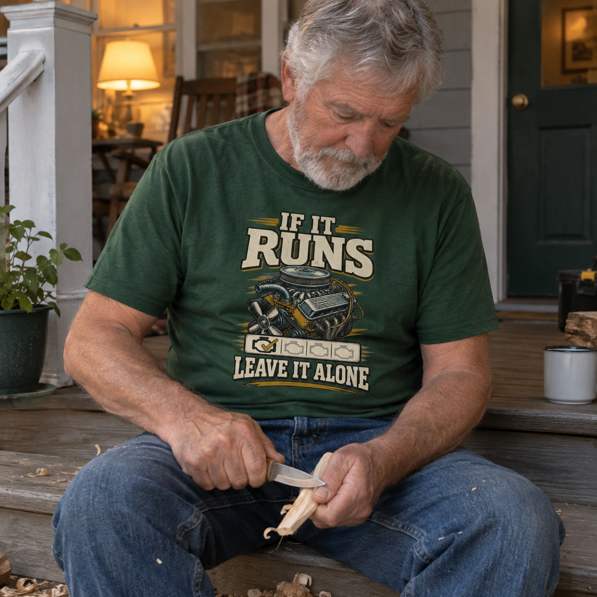 Senior man wearing green vintage t-shirt with “If It Runs Leave It Alone” printed design.