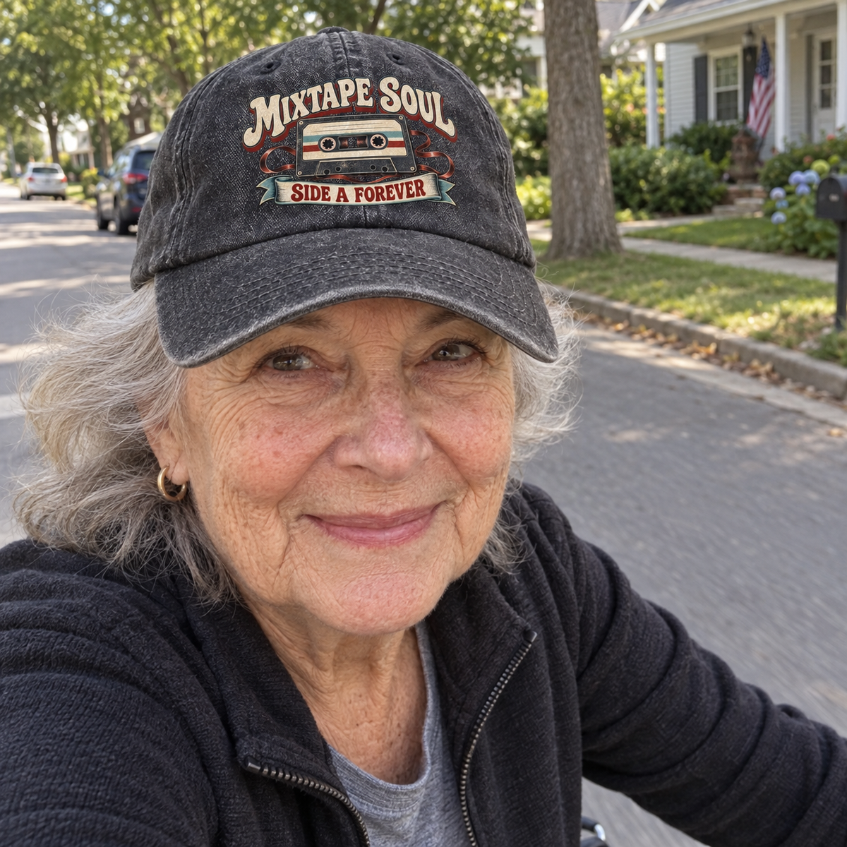 Senior woman wearing charcoal vintage washed cap with printed Mixtape Soul Side A Forever design
