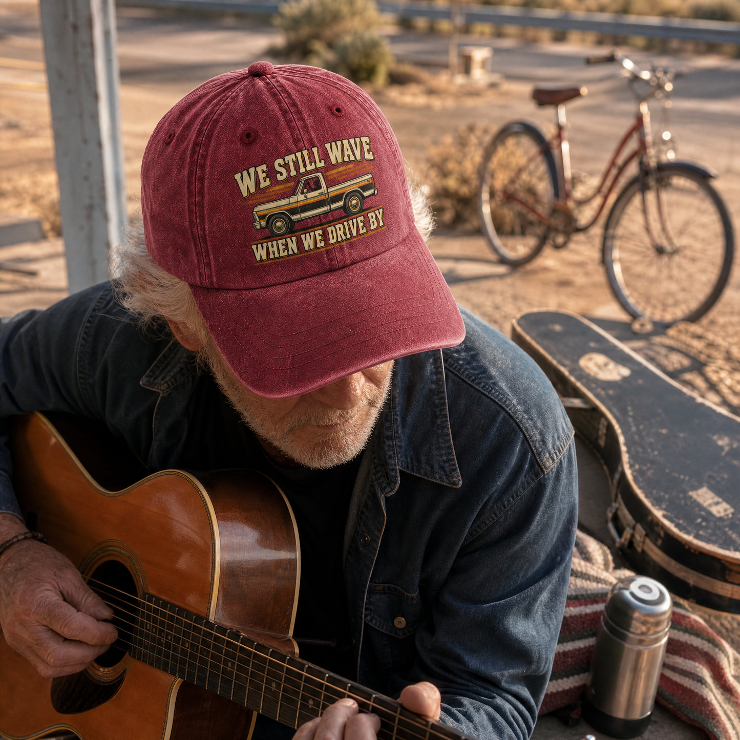 Burgundy vintage washed cap with printed truck and “We Still Wave When We Drive By”