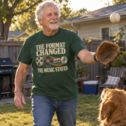 Green vintage t-shirt with printed music slogan worn by senior man playing catch outdoors