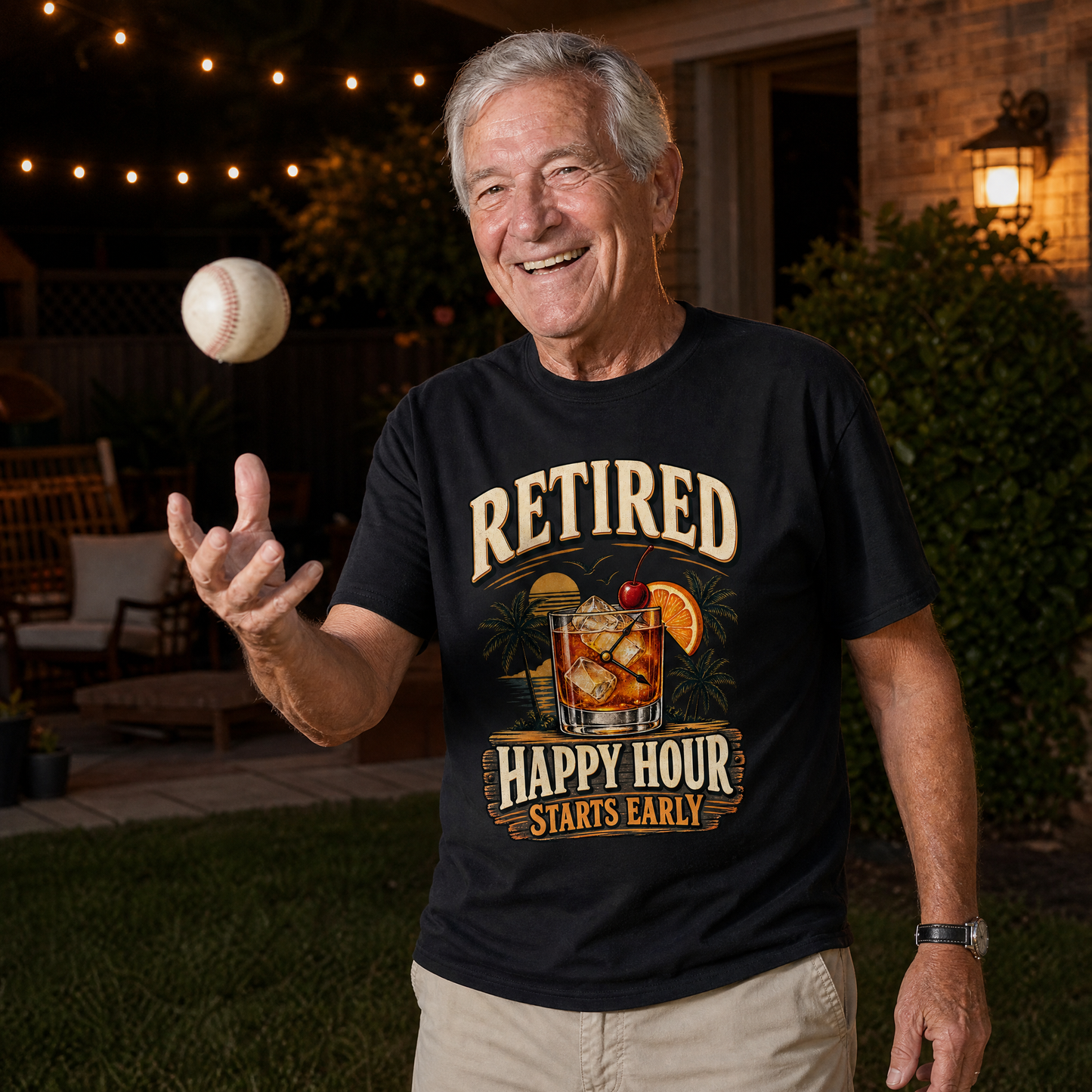 Senior man wearing black vintage t-shirt with printed Retired Happy Hour Starts Early slogan outdoors
