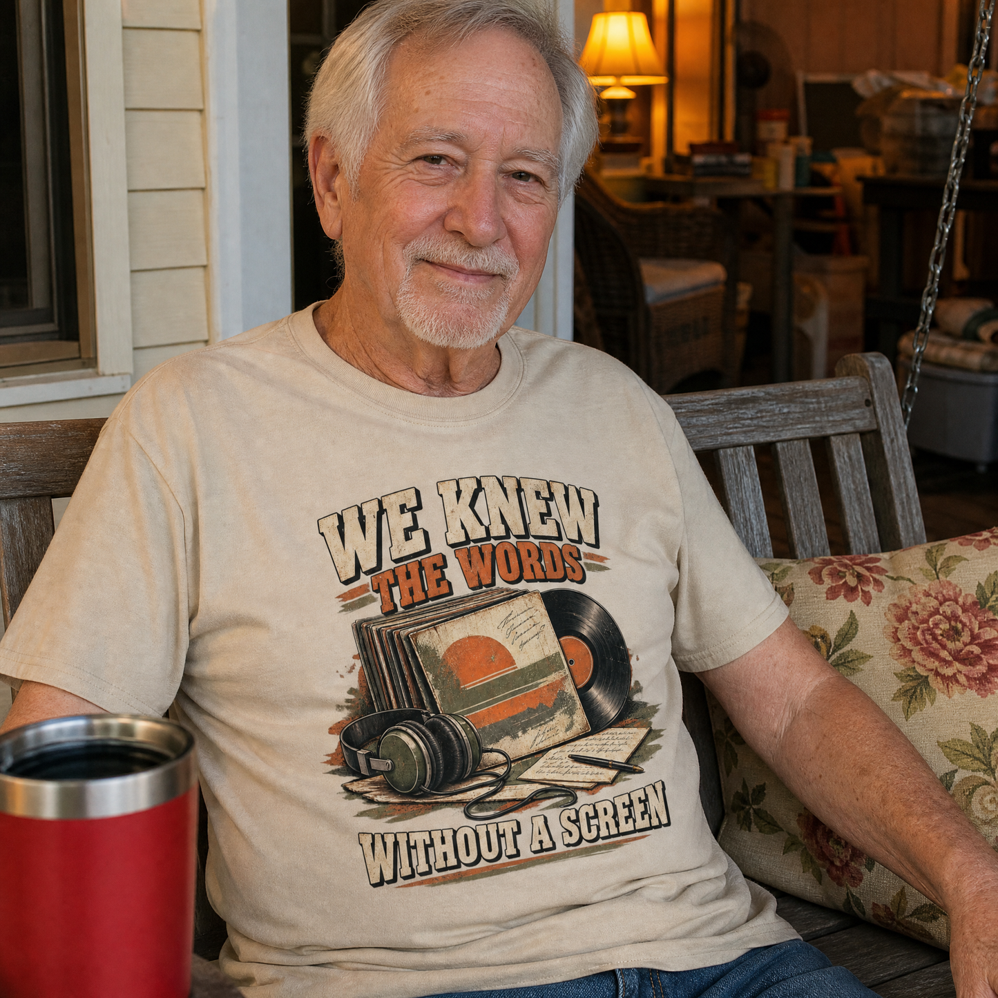 Beige vintage t-shirt featuring printed “We Knew The Words Without A Screen” design on senior man.