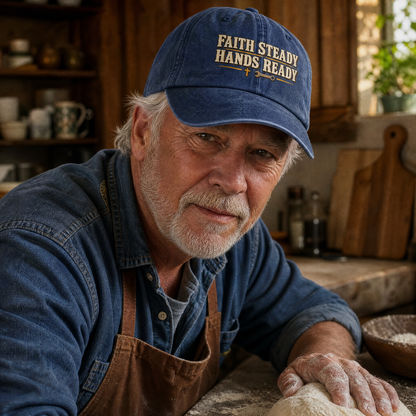 Senior man wearing blue vintage washed cap with printed Faith Steady Hands Ready slogan