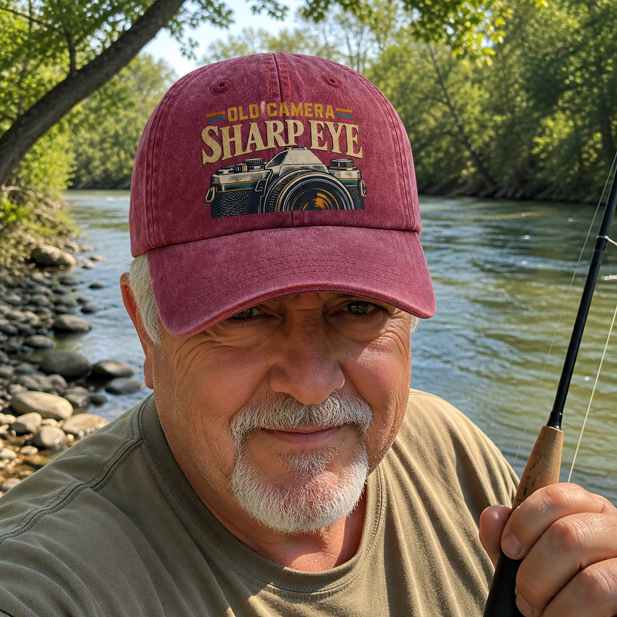 Senior wearing vintage washed cap with Old Camera. Sharp Eye printed design