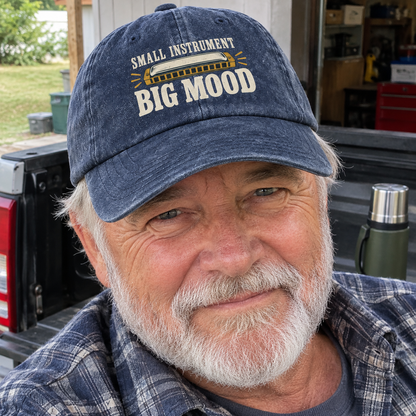 Senior man wearing navy vintage washed cap with Small Instrument Big Mood printed design