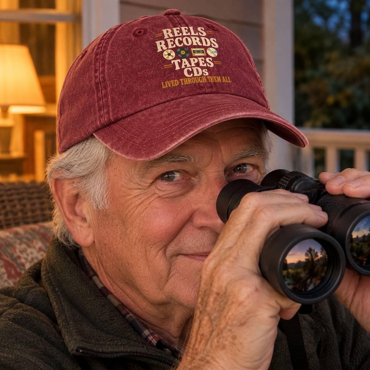 Maroon vintage washed cap with printed Reels Records Tapes CDs slogan, senior man outdoors