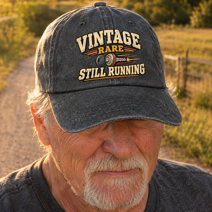 Vintage washed cap with printed Rare Still Running slogan on senior man outdoors