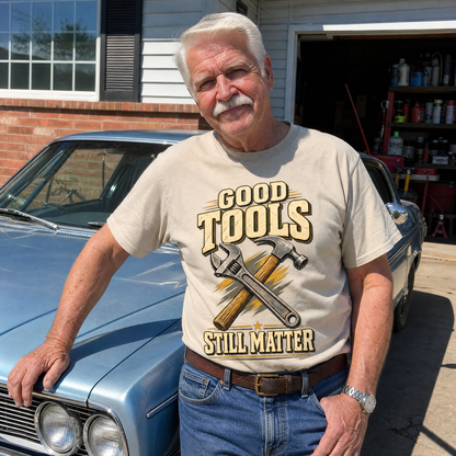 Beige vintage t-shirt with printed Good Tools Still Matter design worn by senior man outdoors