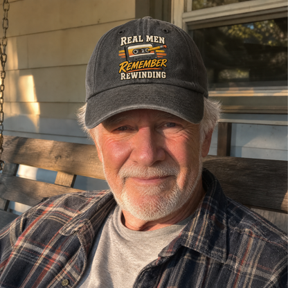 Vintage washed cap with printed “45 real men remember rewinding” slogan, lifestyle view