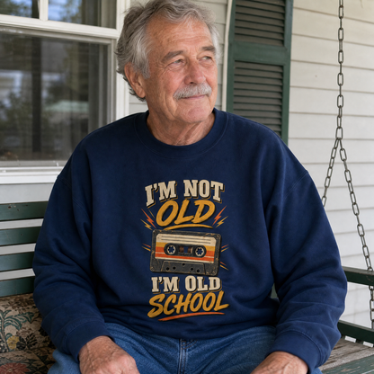 Vintage sweatshirt with printed “41 I’m Old School” slogan, shown in a lifestyle setting