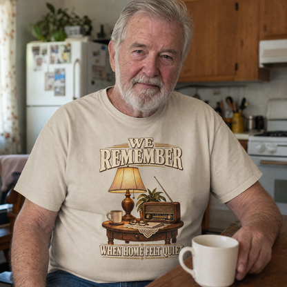 Beige vintage t-shirt with printed We Remember design worn by senior man at home