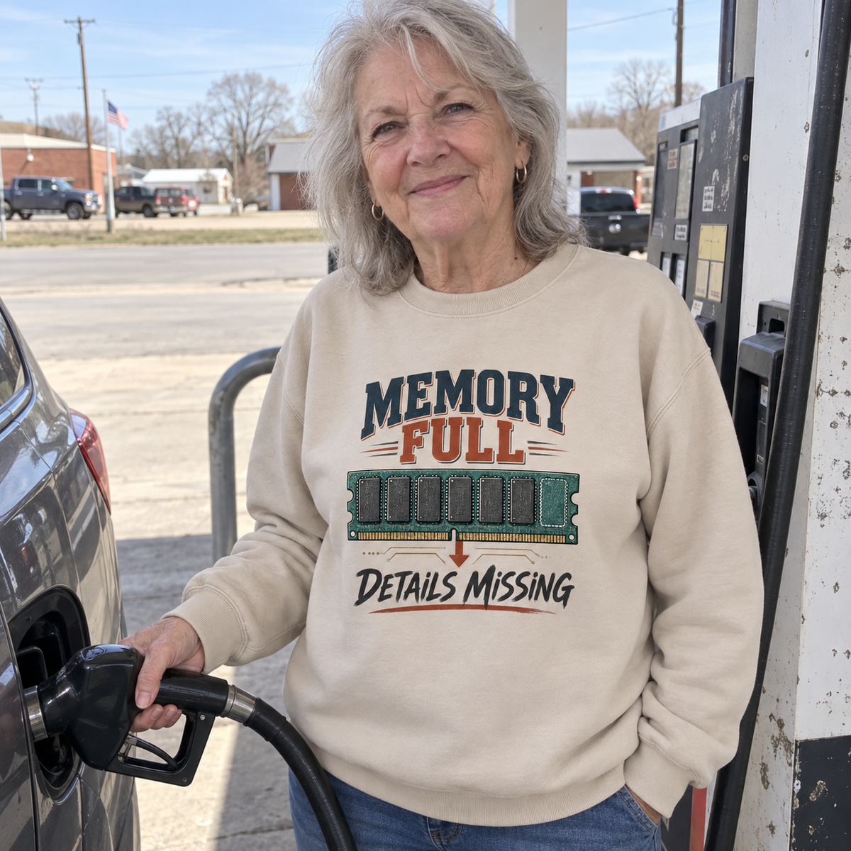 Senior woman fueling a car in beige vintage sweatshirt with printed Memory Full Details Missing design