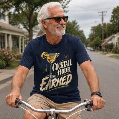 Navy vintage t-shirt with Cocktail Hour Earned print, senior man cycling outdoors