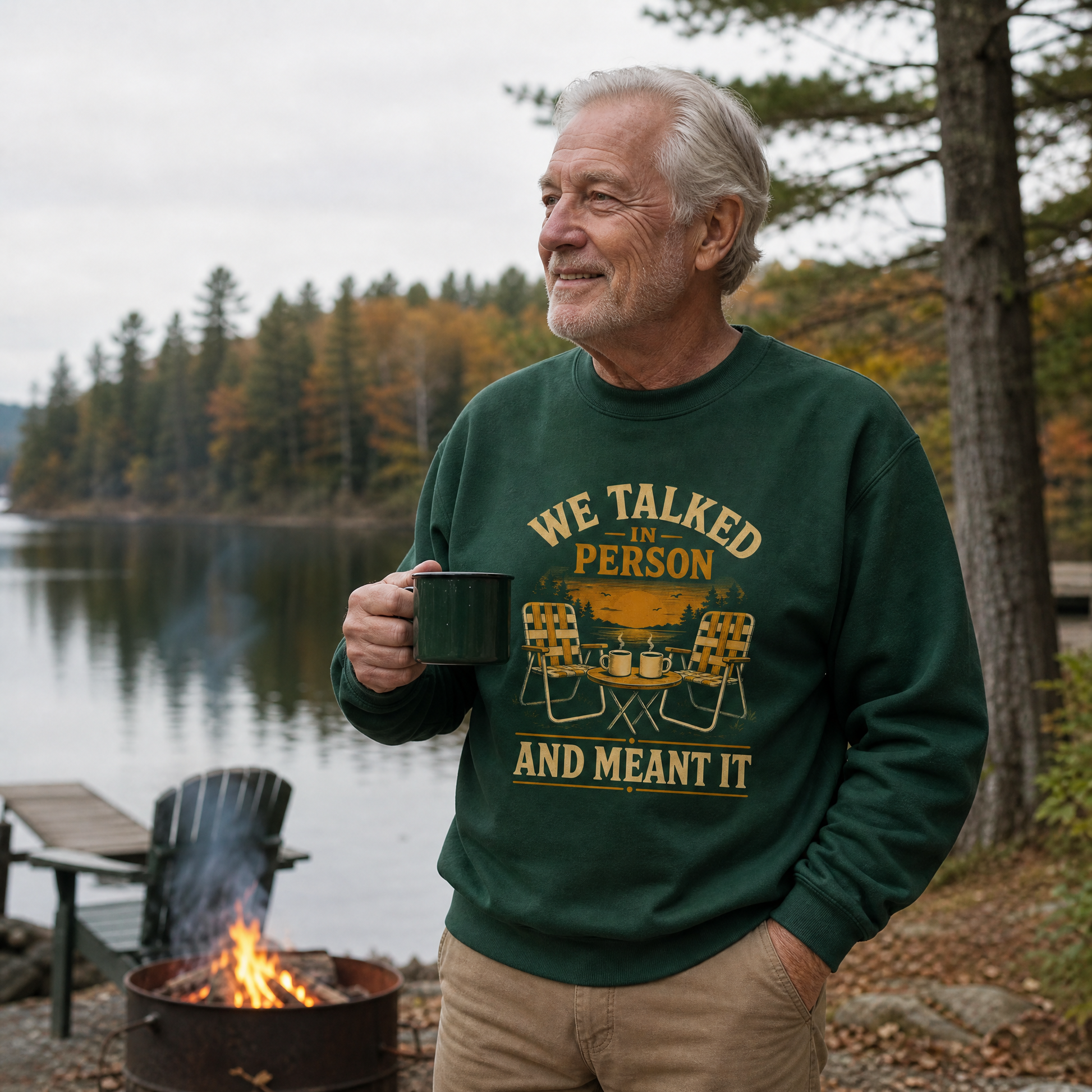 Green vintage sweatshirt with printed We Talked in Person design, worn by senior outdoors.
