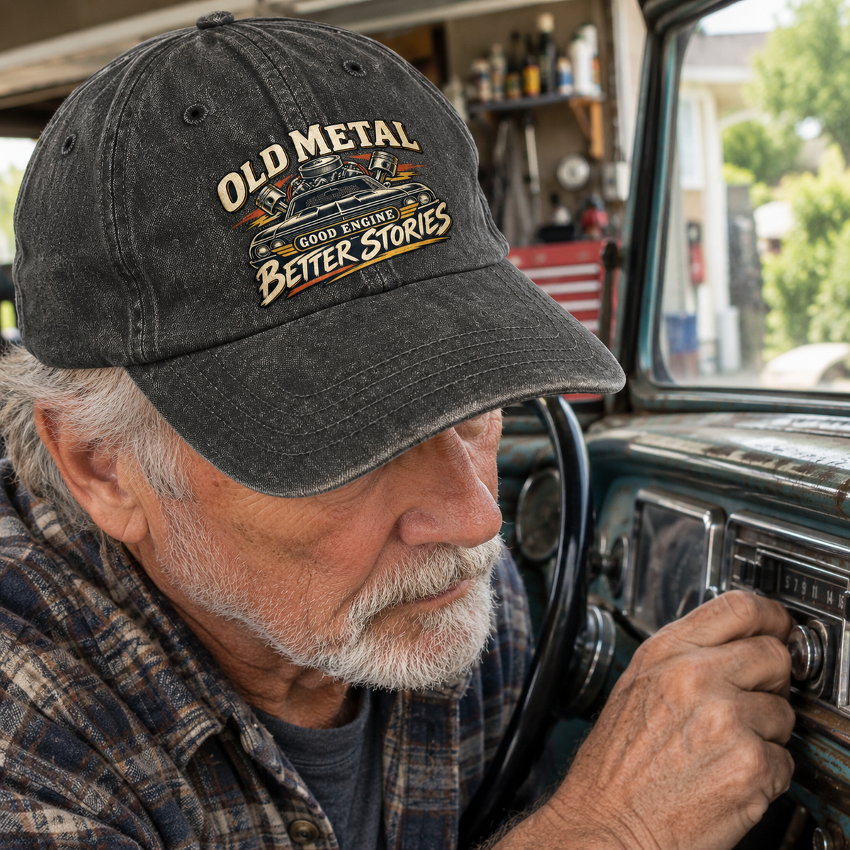Black vintage washed cap printed Old Metal Good Engine Better Stories, worn by senior man.