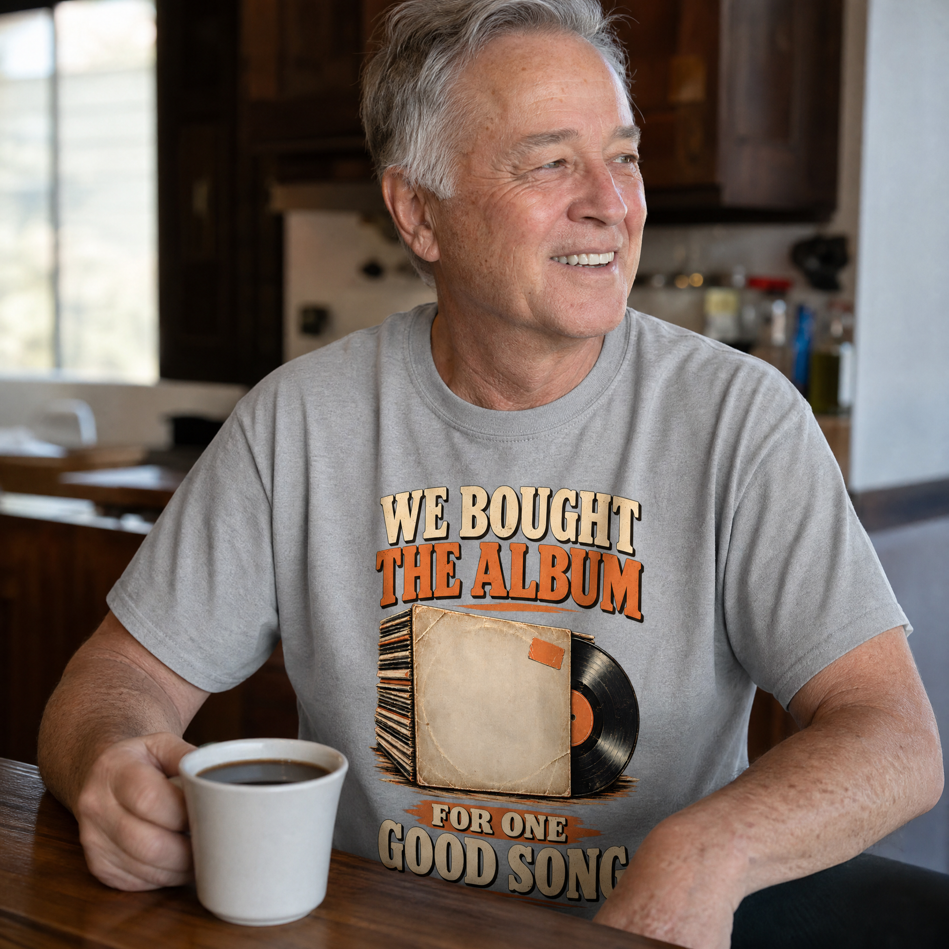 Senior wearing vintage t-shirt with We Bought The Album For One Good Song printed design