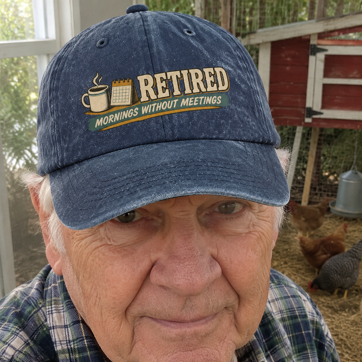 Blue vintage washed cap with printed Mornings Without Meetings slogan worn by senior man outdoors