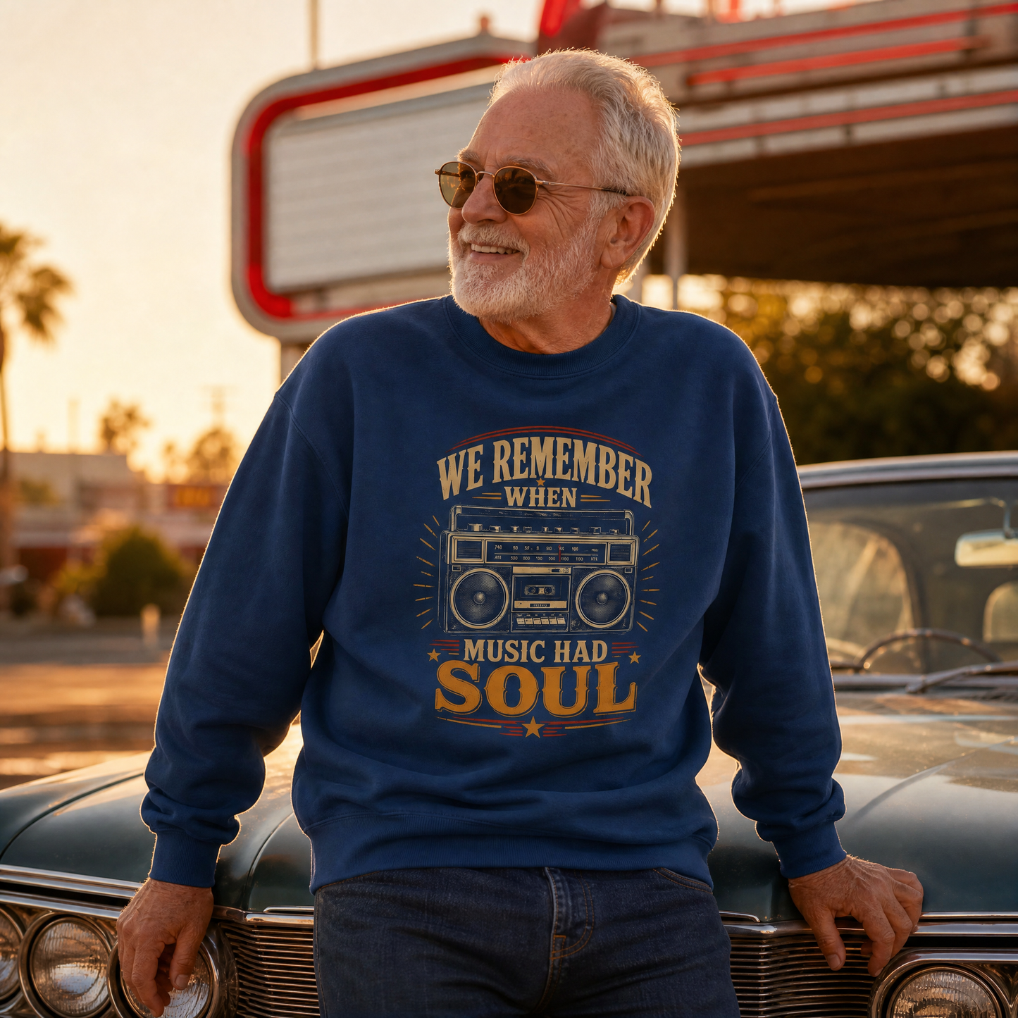 Navy vintage sweatshirt with printed “Music Had Soul” design, worn by senior man outdoors.