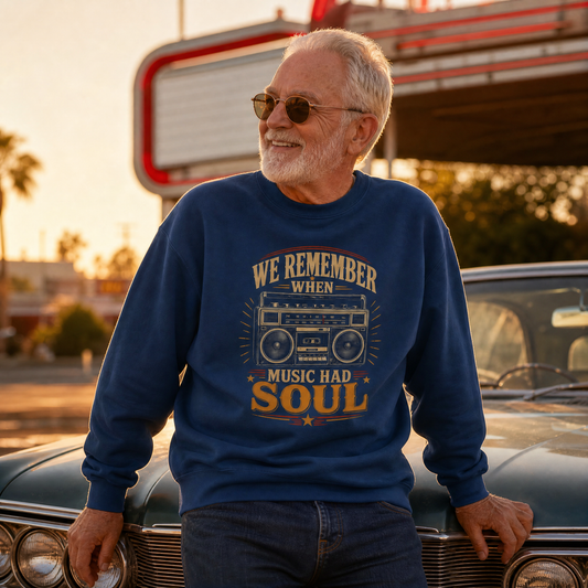 Navy vintage sweatshirt with printed “Music Had Soul” design, worn by senior man outdoors.
