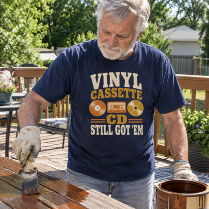 Senior man wearing navy vintage t-shirt with Vinyl Cassette CD Still Got 'Em print outdoors