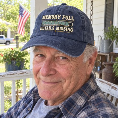 Senior man wearing navy vintage washed cap with printed Memory Full Details Missing slogan outdoors.