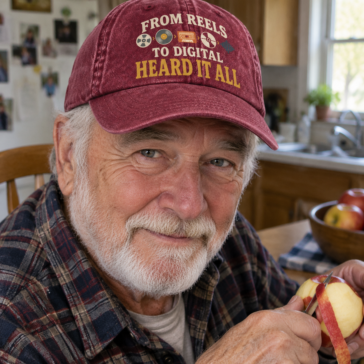 Vintage washed cap with printed slogan worn by senior man in kitchen, front view