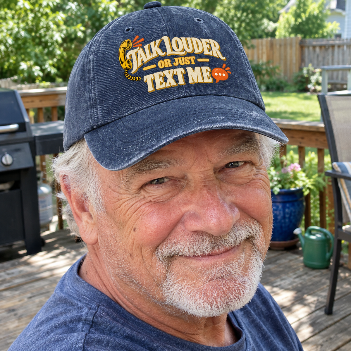 Senior man wearing vintage washed cap with printed Talk Louder Or Just Text Me outdoors