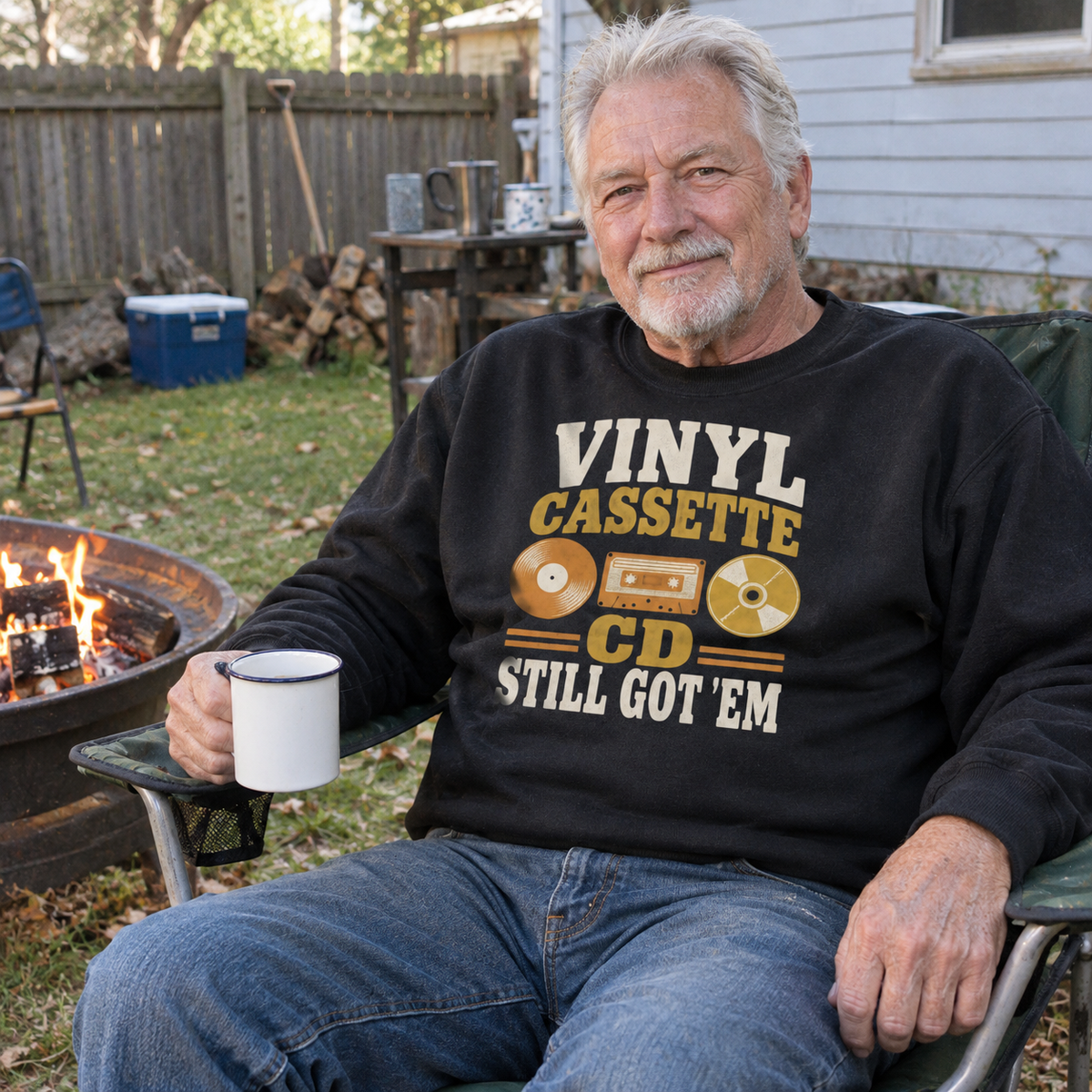 Senior man wearing black vintage sweatshirt with printed Vinyl Cassette CD Still Got 'Em slogan