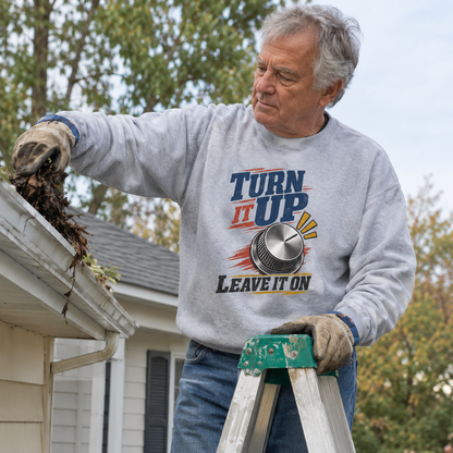 Senior man wearing gray vintage sweatshirt with Turn It Up Leave It On printed design