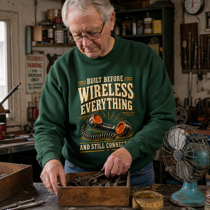 Green vintage sweatshirt printed with “Built Before Wireless Everything And Still Connecting”