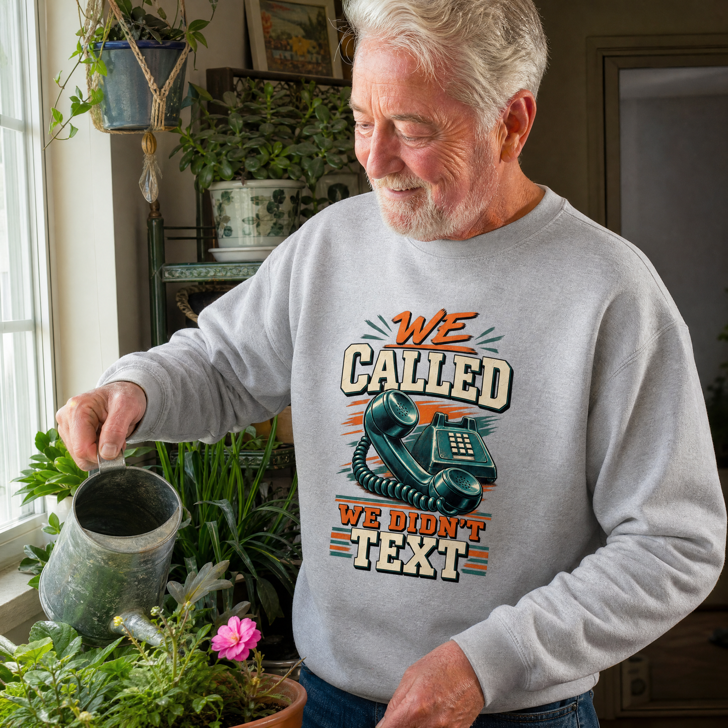 Gray vintage sweatshirt with printed “We Called. We Didn't Text” design, worn by senior man.