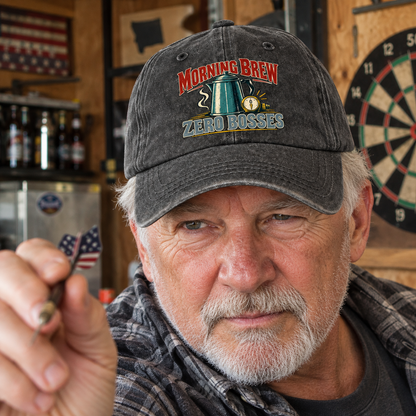 Senior man wearing a charcoal vintage washed cap with printed Morning Brew. Zero Bosses slogan