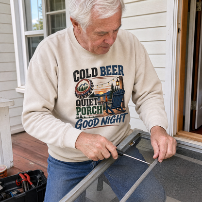Cream vintage sweatshirt with printed Cold Beer Quiet Porch Good Night design, worn by senior man outdoors.