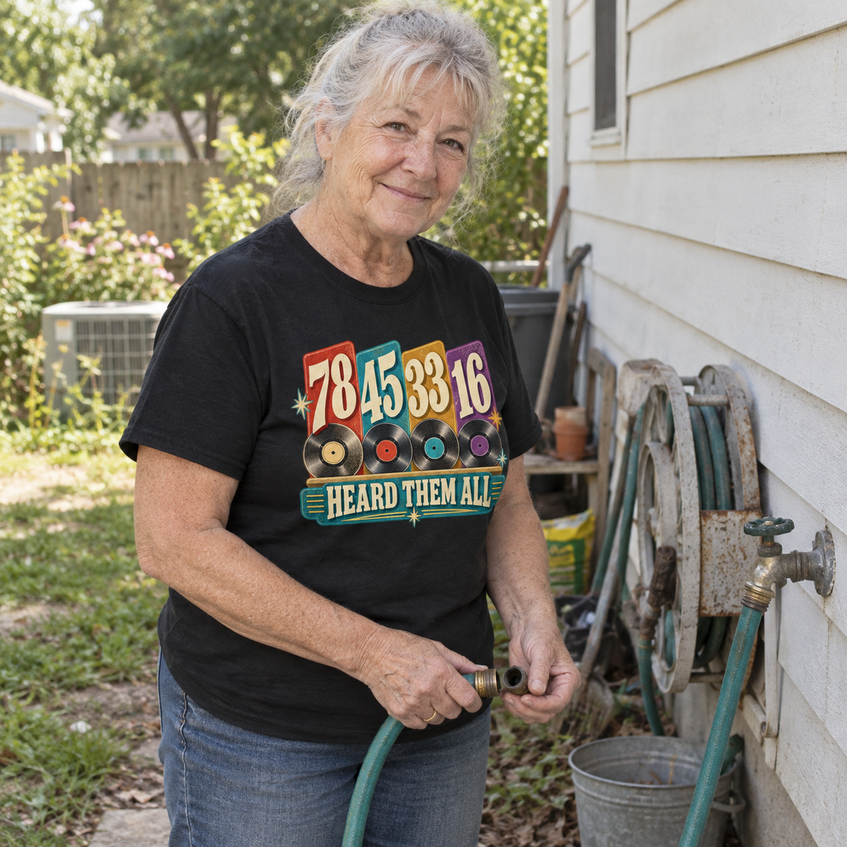 Senior woman outdoors in black vintage t-shirt printed with 78 45 33 16, Heard Them All.
