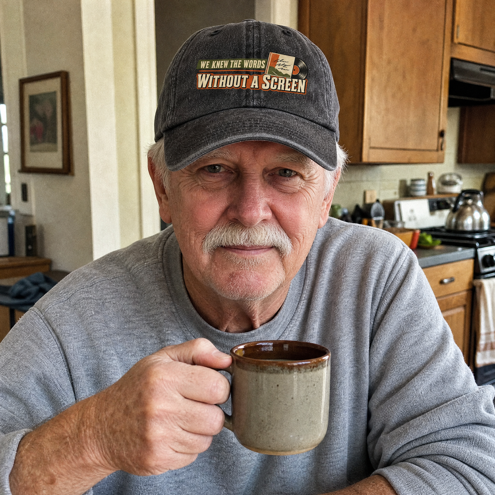 Senior man wearing vintage washed cap printed with We Knew The Words Without A Screen