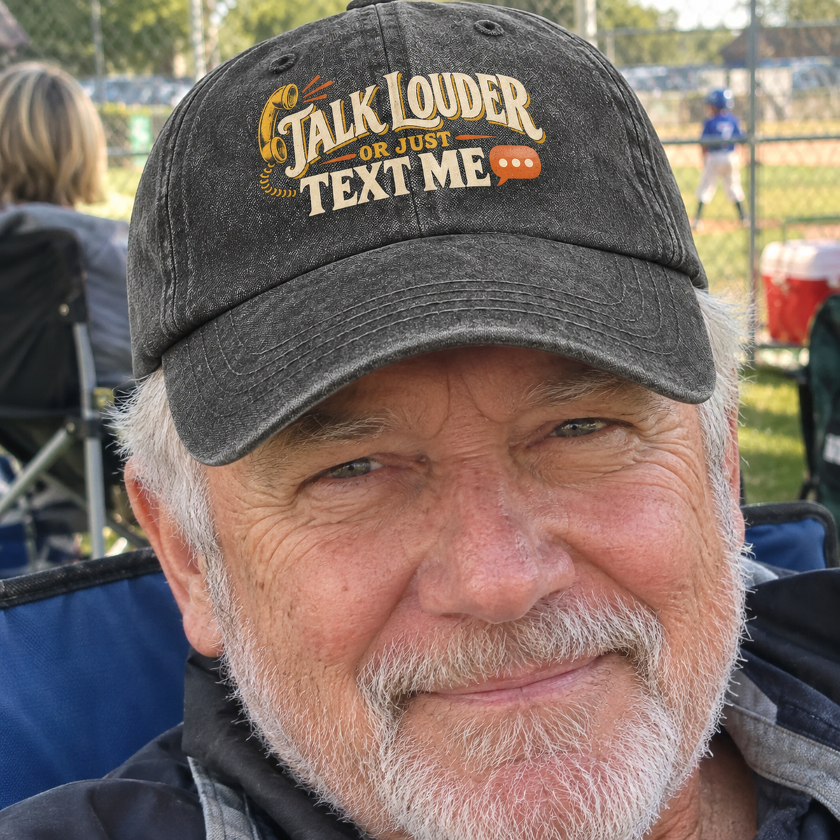 Senior man wearing vintage washed cap with printed Talk Louder Or Just Text Me slogan