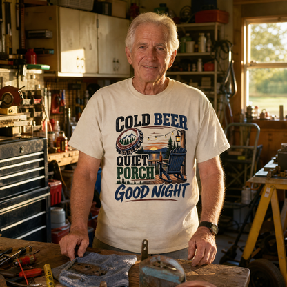 Vintage t-shirt with printed Cold Beer Quiet Porch Good Night design, worn by senior man in workshop.